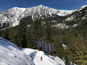 Solar panels and skier